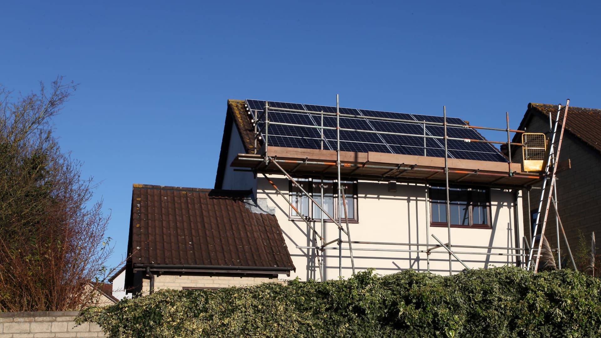 a house with solar panels on the roof