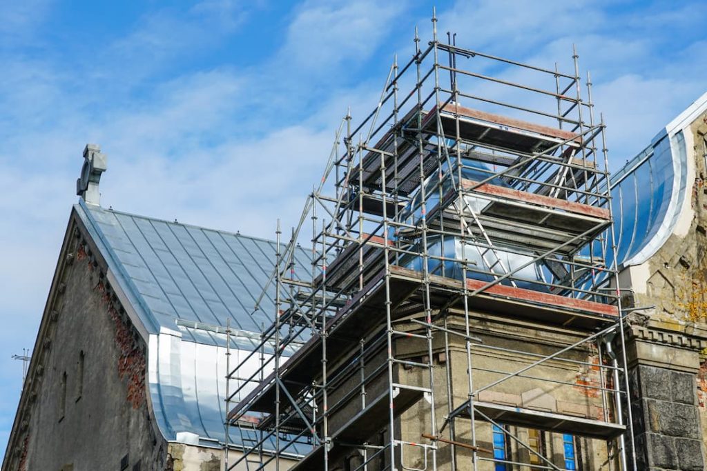a building under construction with scaffolding